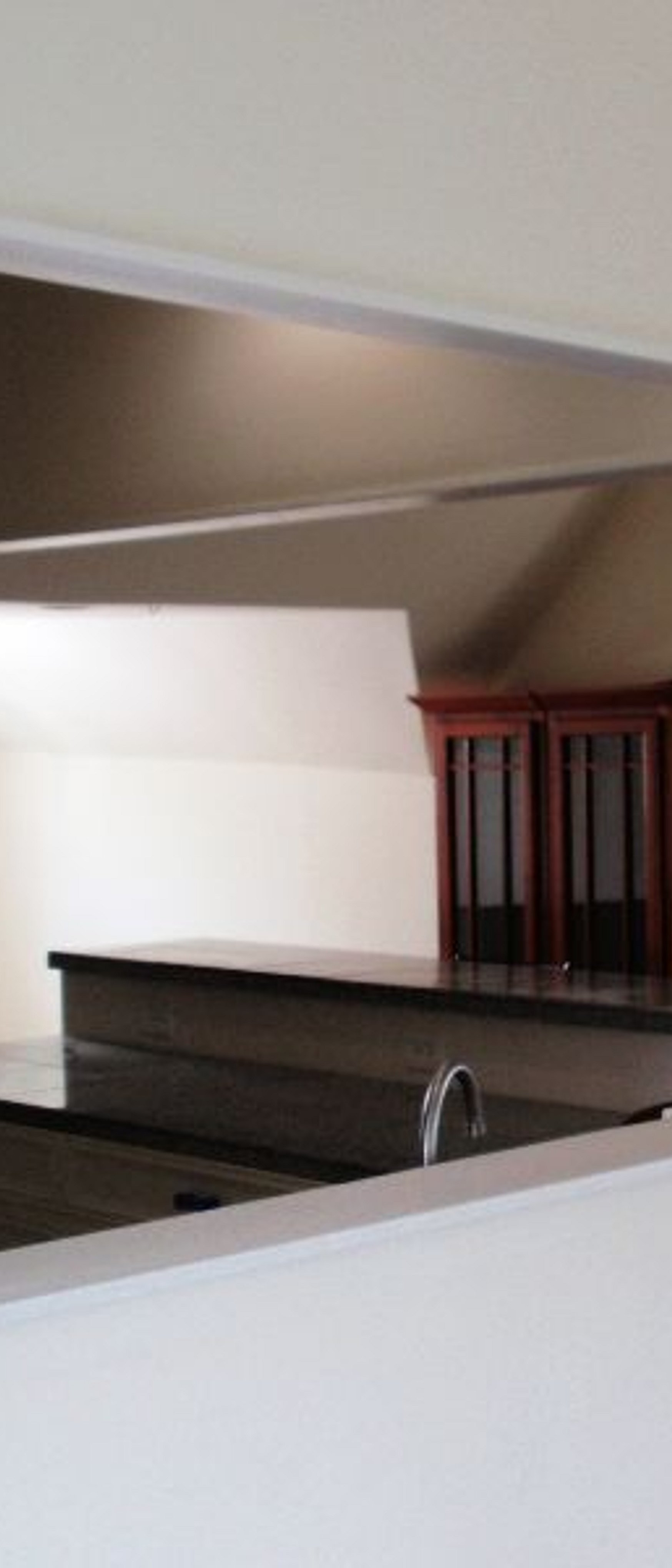 living area facing bed area