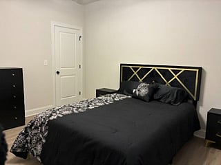 New queen bed with chest and 2 nightstands