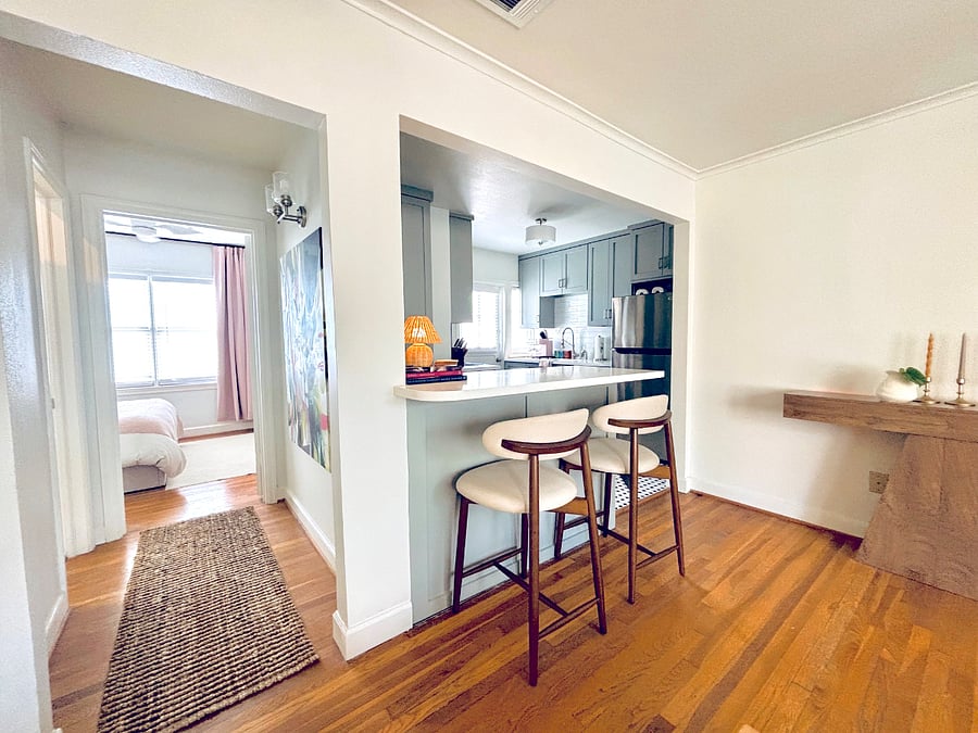 island and hall to bedroom