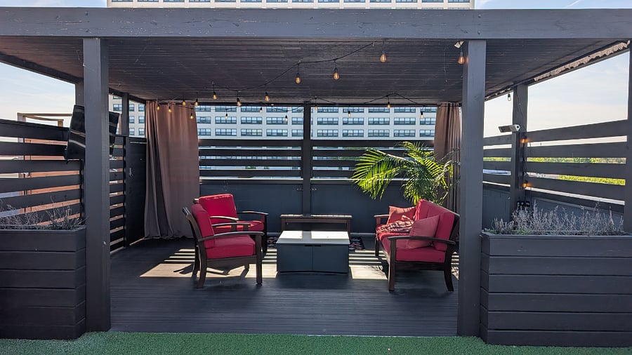 Private pergola with seating, fire table, and smart TV (warm months)