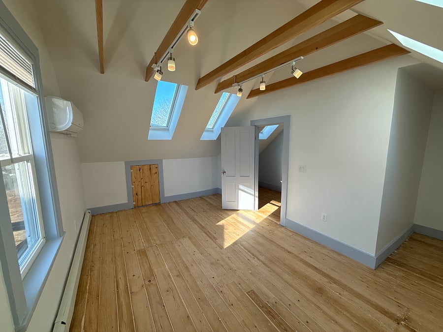 Bedroom on third floor. Storage in the eves of the house
