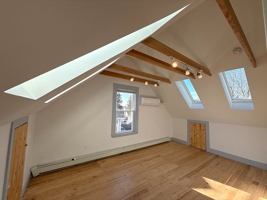 Bedroom on third floor. Storage in the eves of the house