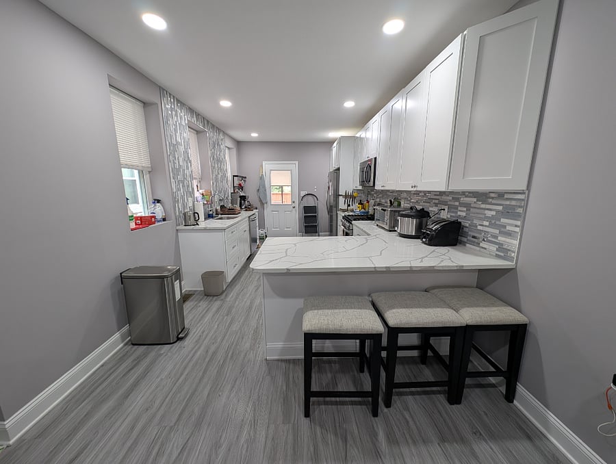 Shared open kitchen with dining area