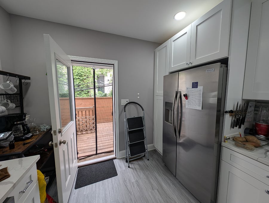 Shared kitchen area and back patio