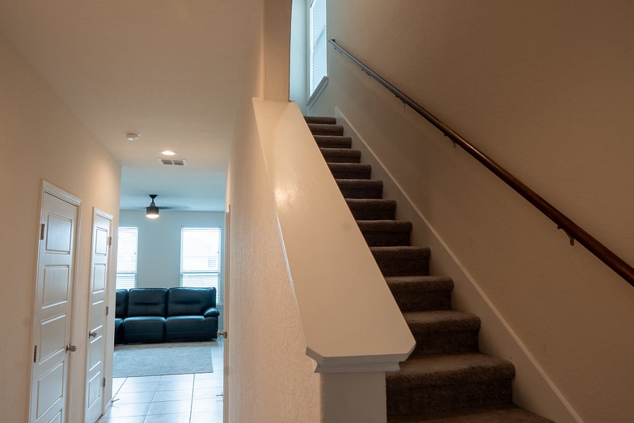 Entryway with Direct Access to the Living Room and Upper Level