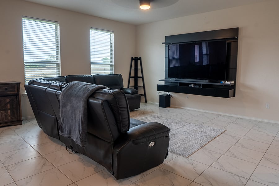 Living Room featuring a 72' Smart Tv & Surround Sound System.