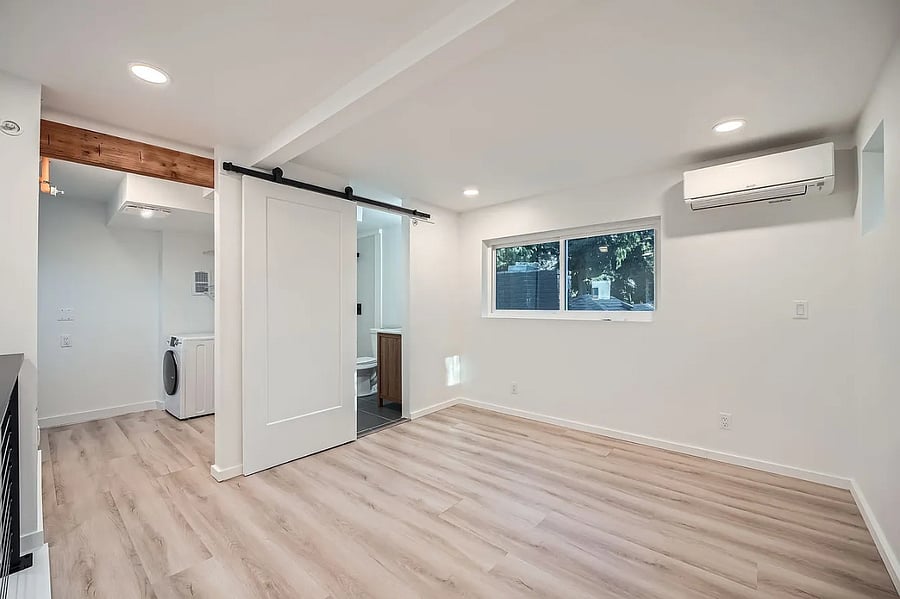 Room and walk-in closet with small den