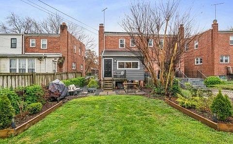 Back yard and patio - accessible from the sunroom and basement.