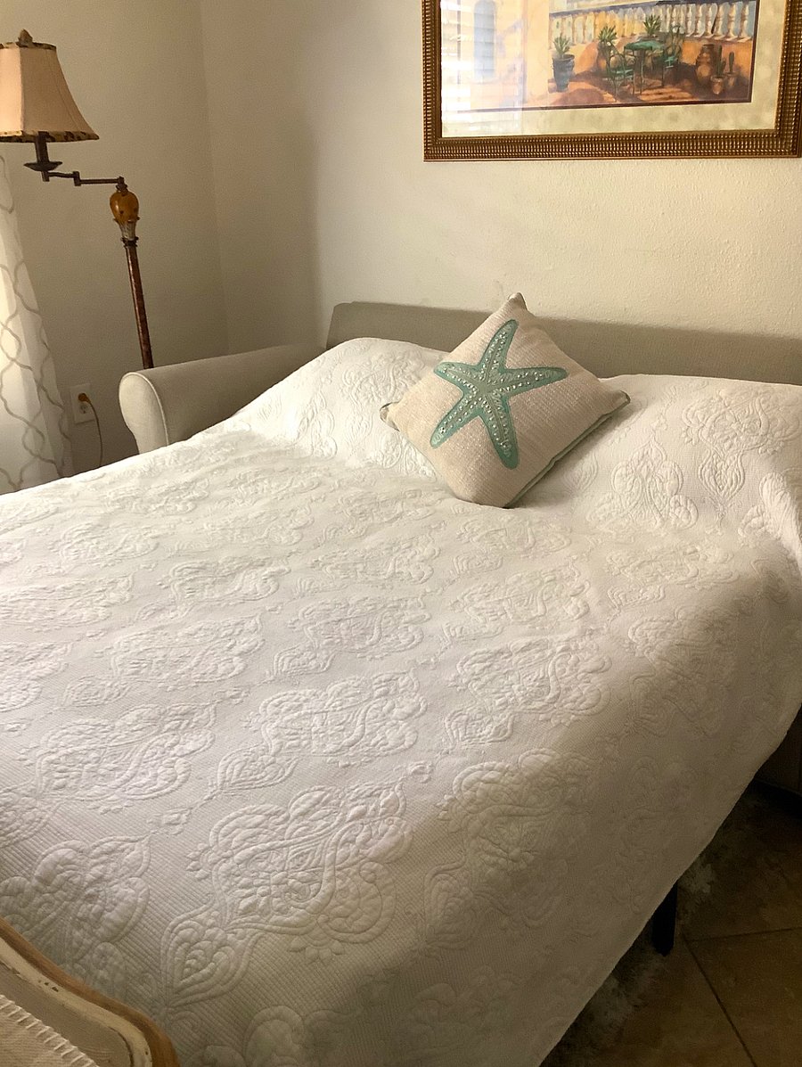 3rd Bedroom/Office with Queen Pull out bed, small walk-in closet 35" TV. It includes credenza desk for working.