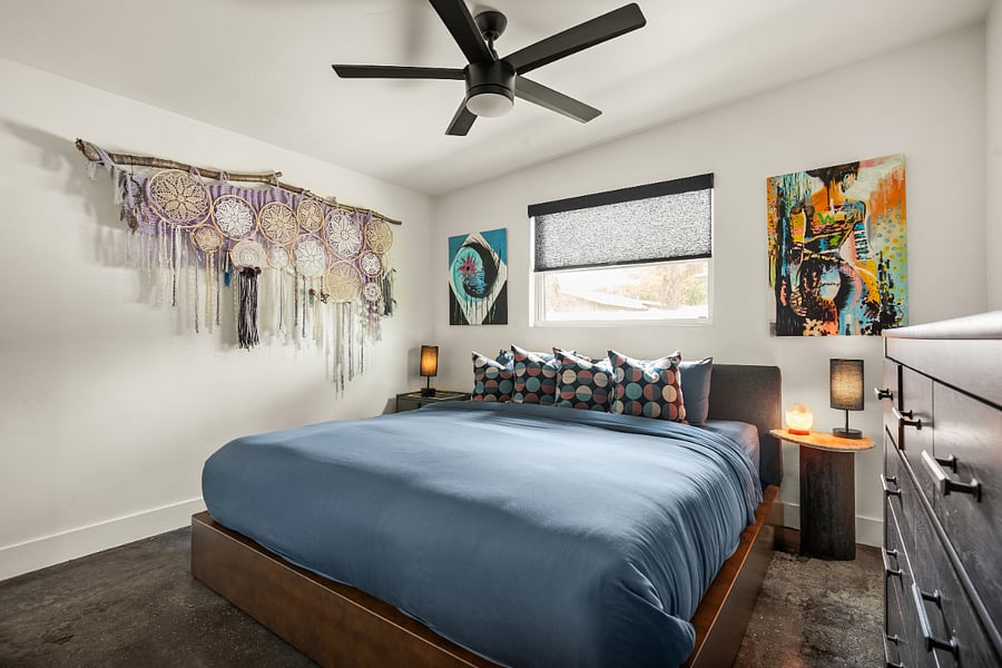 Primary Bedroom with king bed and 1/2 bath