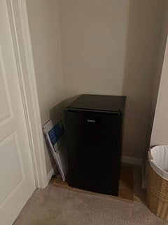 Fridge in bedroom