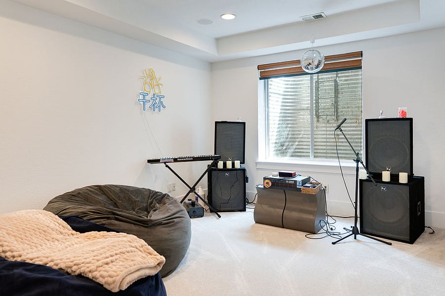 Finished basement with sound system and chill space