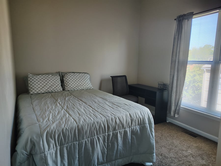 Guest bed with desk and chair