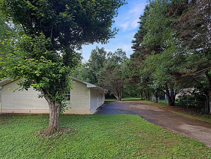 Large parking area and backyard. No access to this detached garage used as storage area for owners.