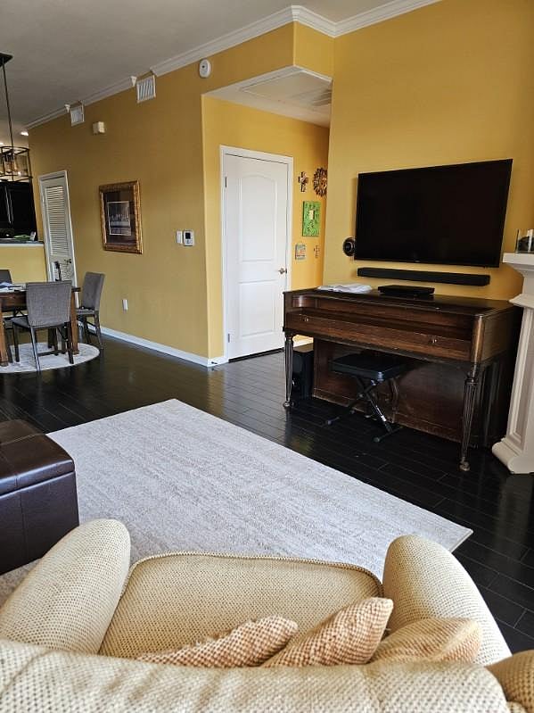 Living room with TV & piano