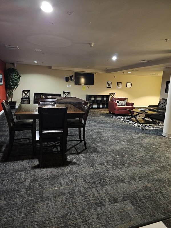Community room with TV and pool table