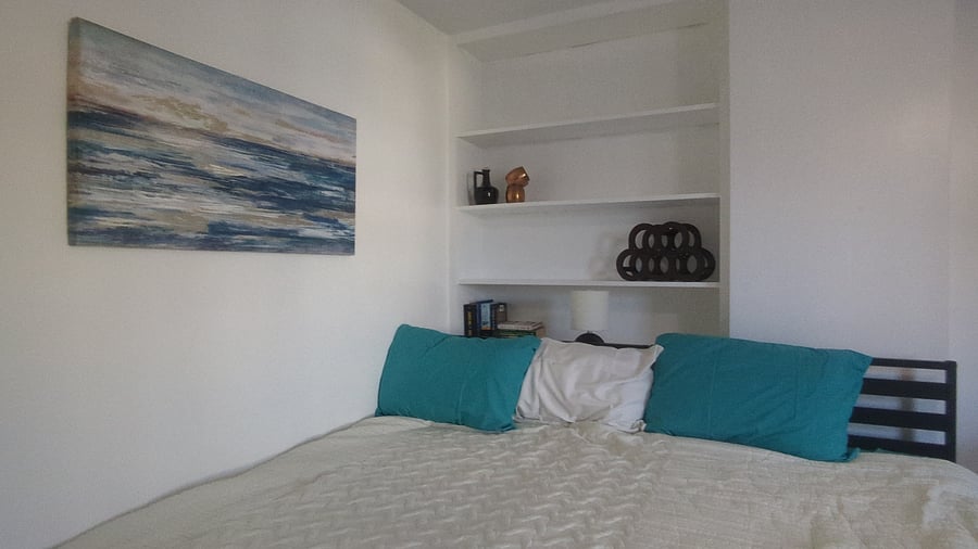 Front bedroom (Single Deluxe) - Twin XL or King bed (shown).