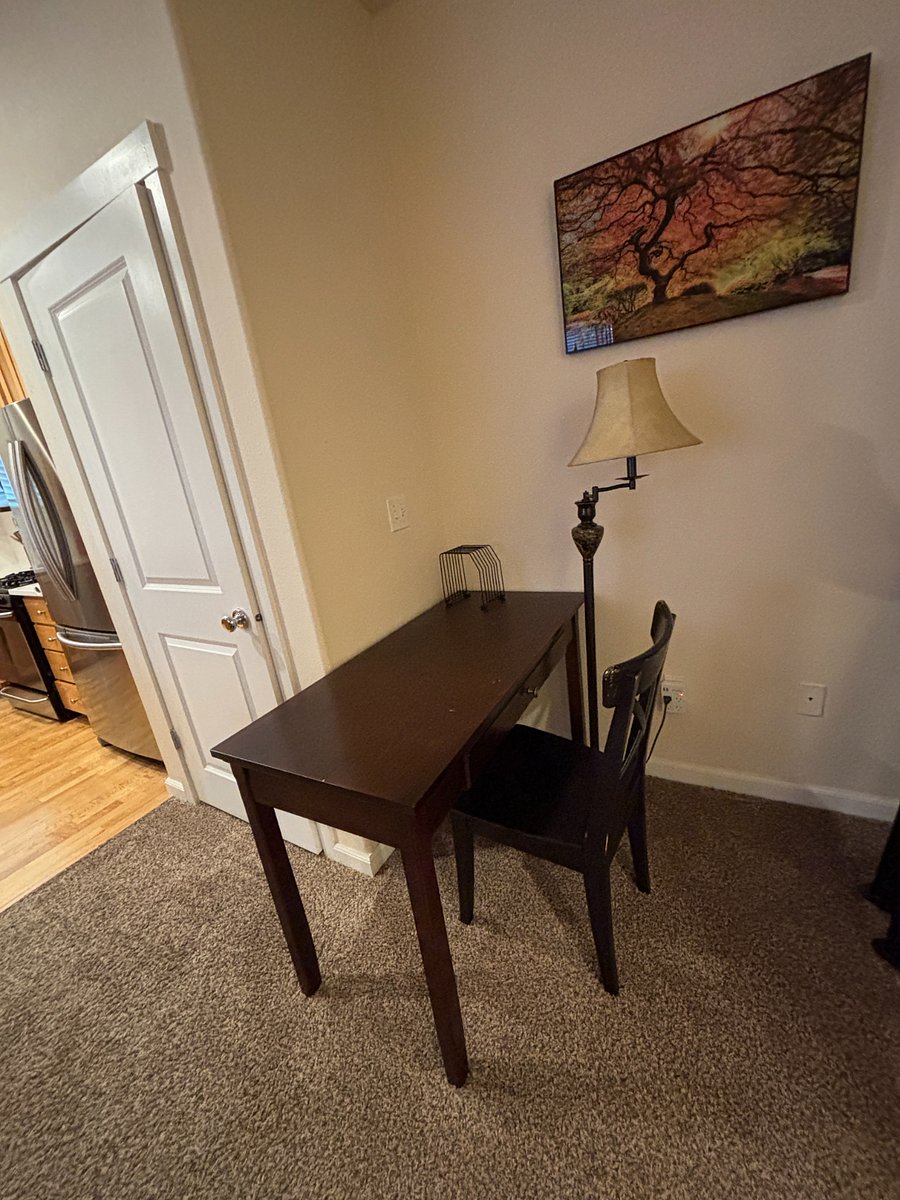 Main floor work desk, lamp and USB outlet.