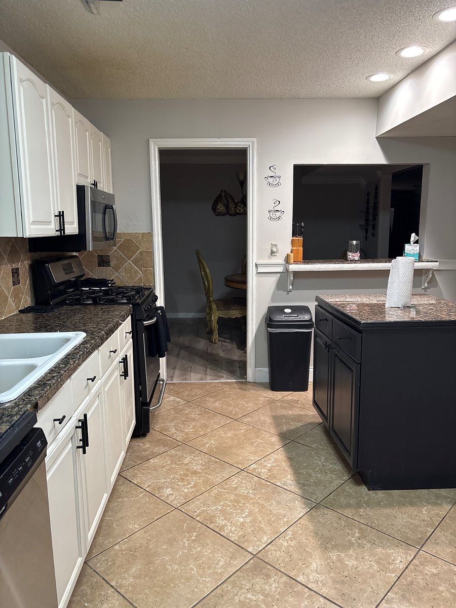 Full kitchen with appliances; Stove, Refrigerator, Microwave, Air Fryer, Utensils, Cookware, etc.
