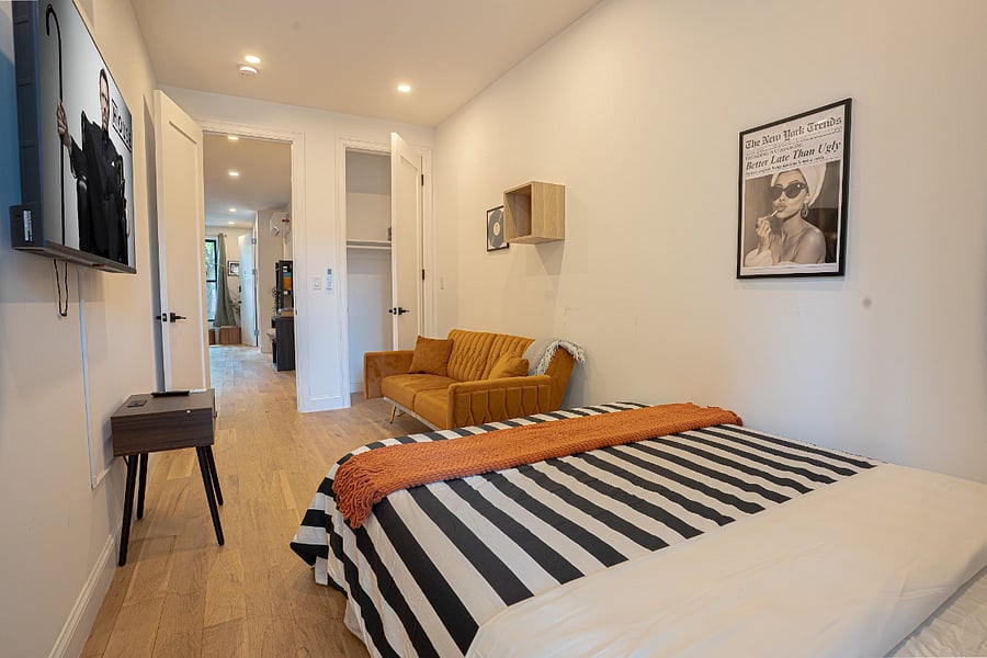 Bedroom 2 - smart TV, A/C, and bright window