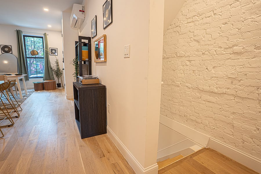 Media corner with large TV and soundbar