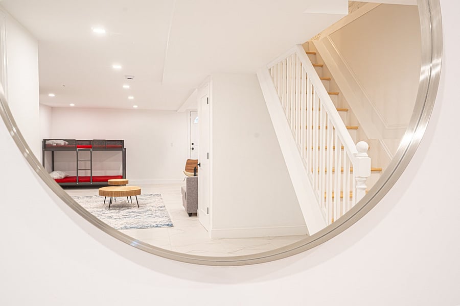 Spacious basement rec room - lounge, media, and workspace