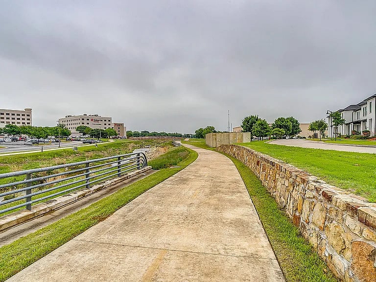 Walking trail around the neighborhood. Approximately 1 mile if you do the full loop.