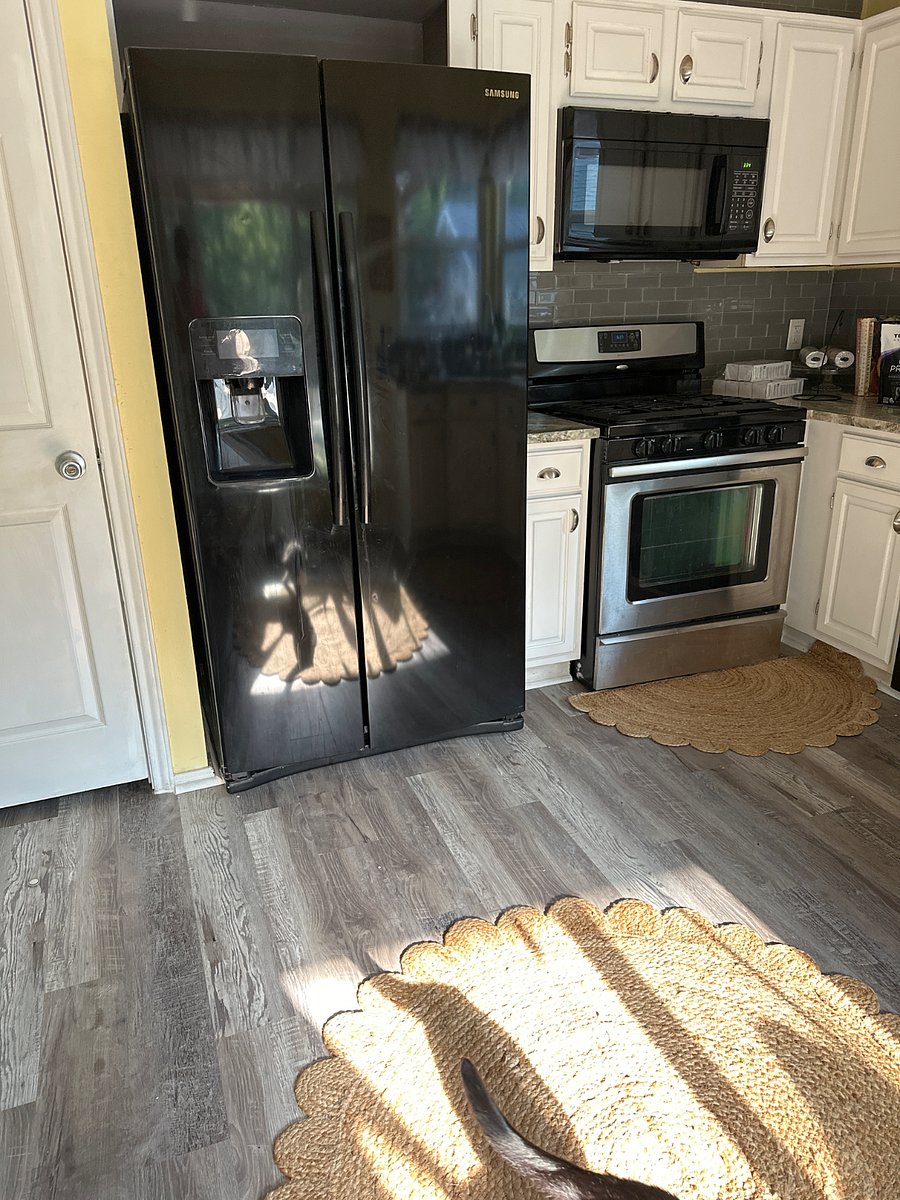 Large refrigerator and gas stove