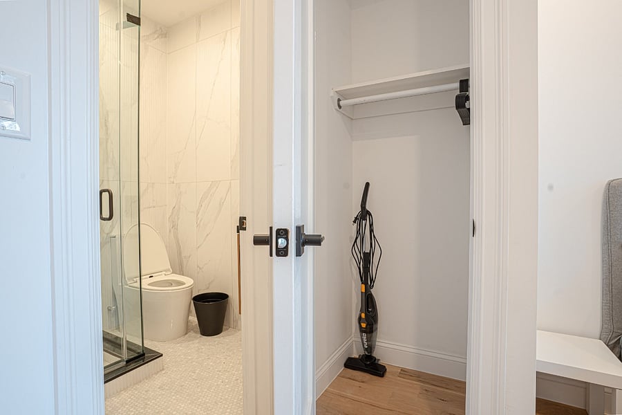 Walk-in shower and closet storage