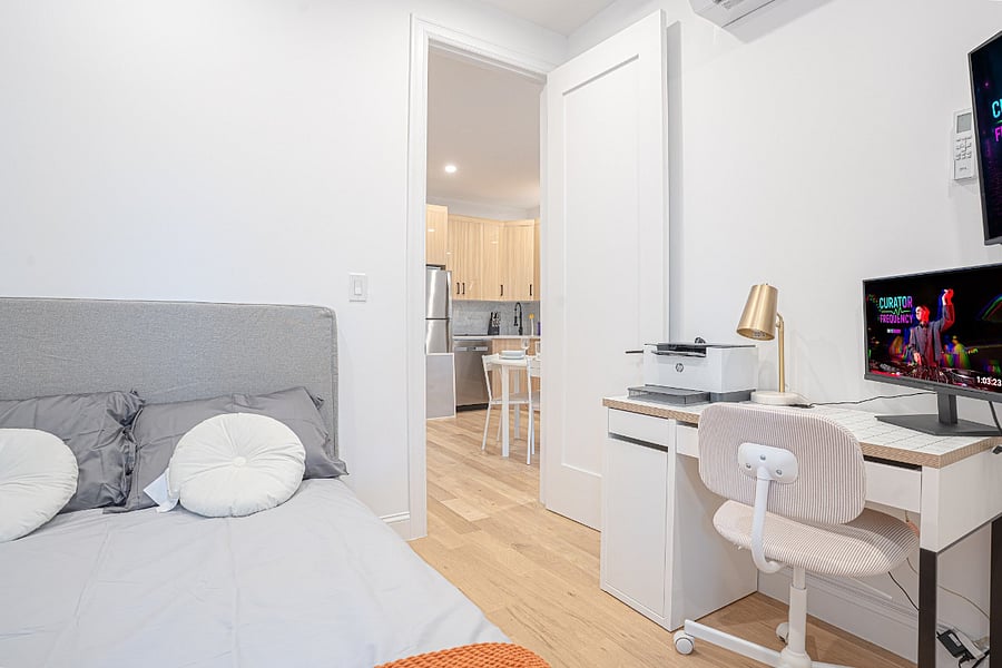Dedicated workspace with desk and daybed lounge