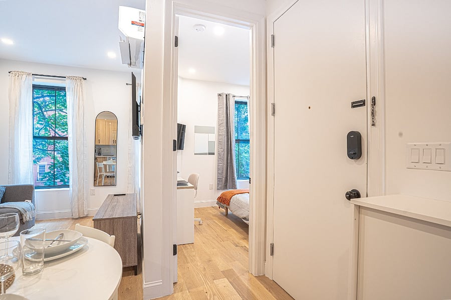 Living and dining with hallway to bedrooms