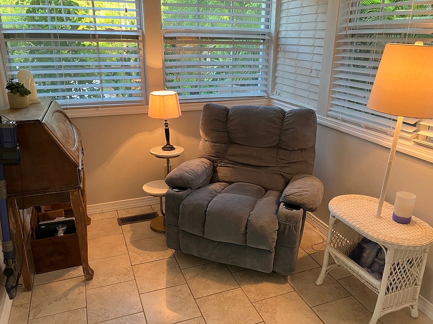 Reading room, two large storage closets, and door to back deck.