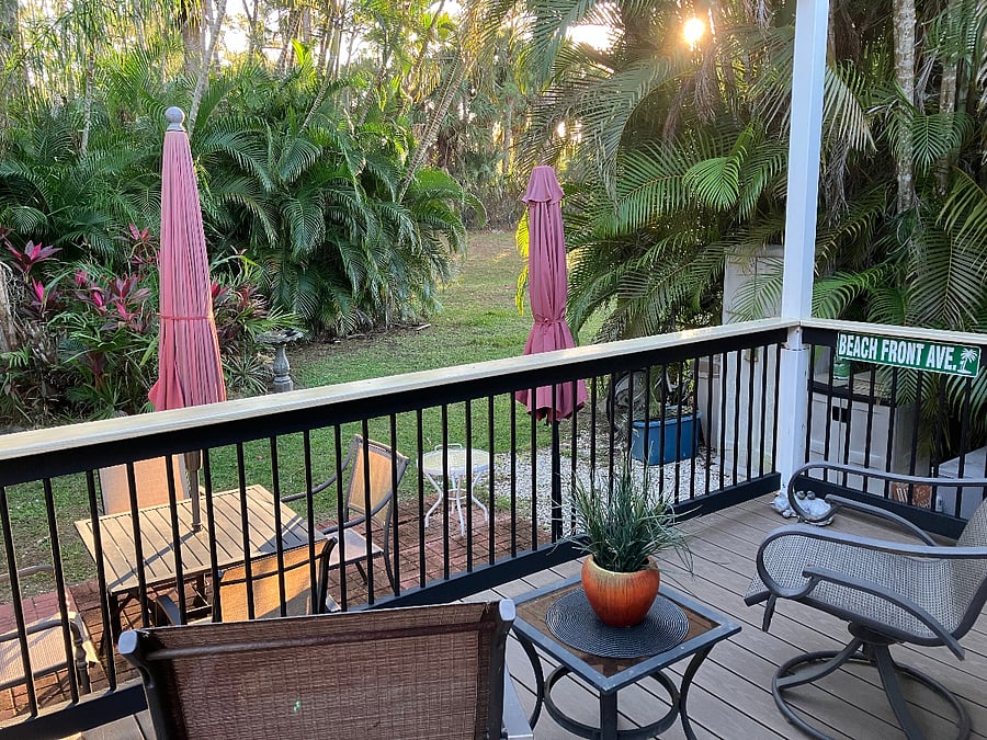 Back deck, overlooking private tropical backyard and patio