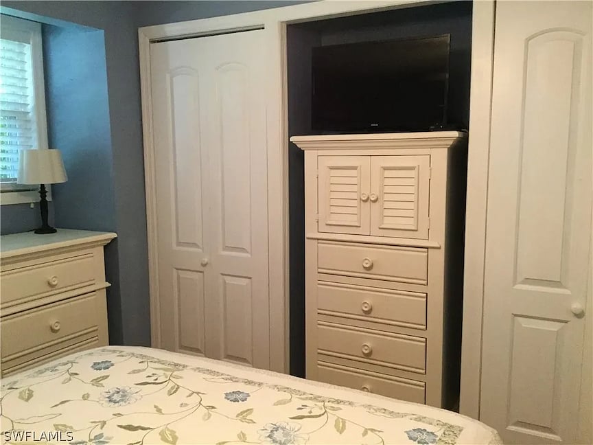 Master bedroom, queen Sleep Number bed, two closets, dressers