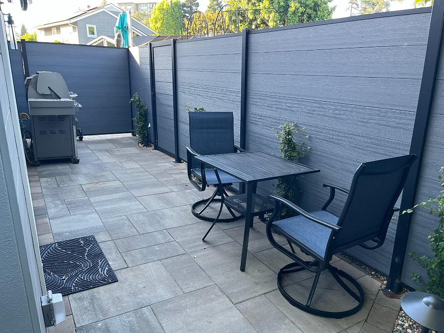 Private patio with BBQ and comfortable seating.