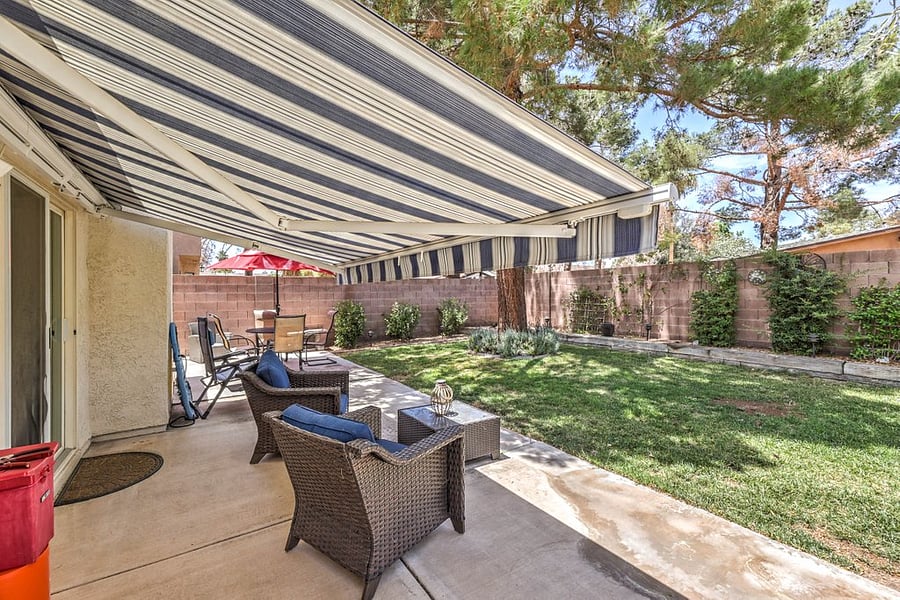 Exterior seating with motorized awning