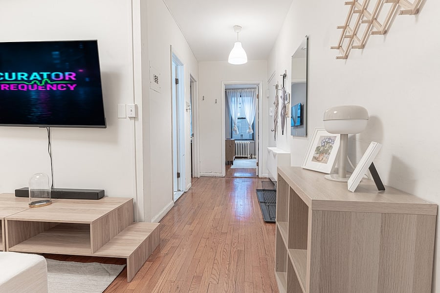 Lounge corner with smart TV, media console & comfortable seating