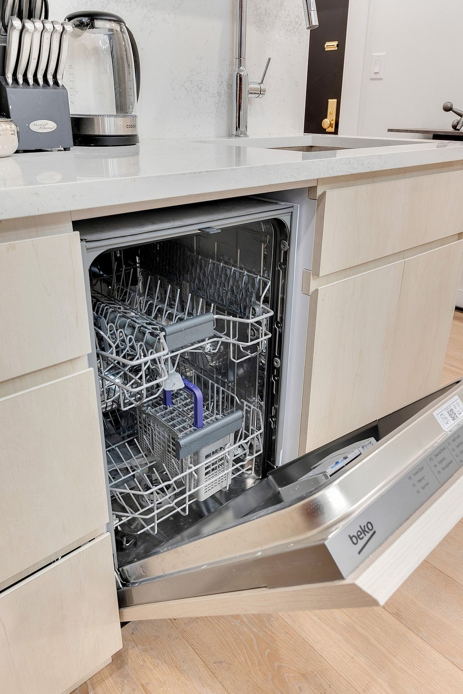 Full-size dishwasher  a rare NYC convenience in the sleek renovated kitchen.