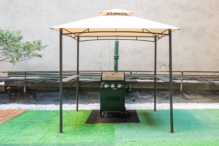 Gazebo with BBQ grill station  grill nights above NoMad.