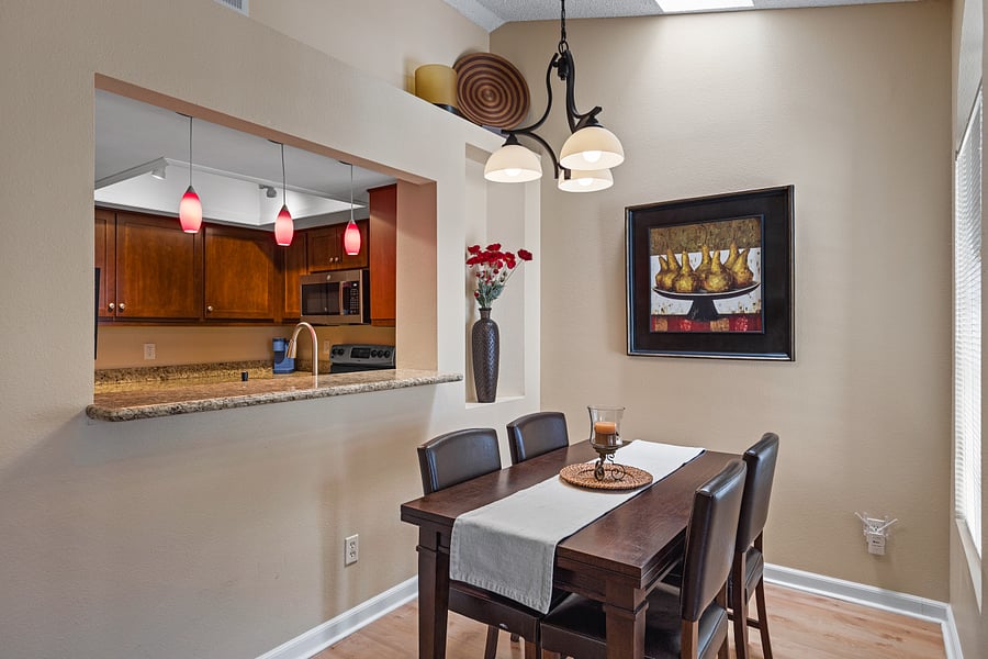 Dining Area- table seats 6 and has additional leaves that can be let out. More chairs in closet.