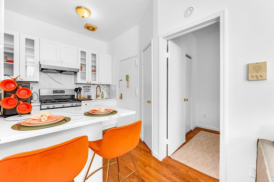 Quartz breakfast bar with seating for two.