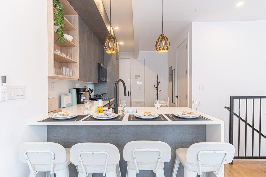 Dining nook beside the kitchen island  a comfortable spot for meals at home.