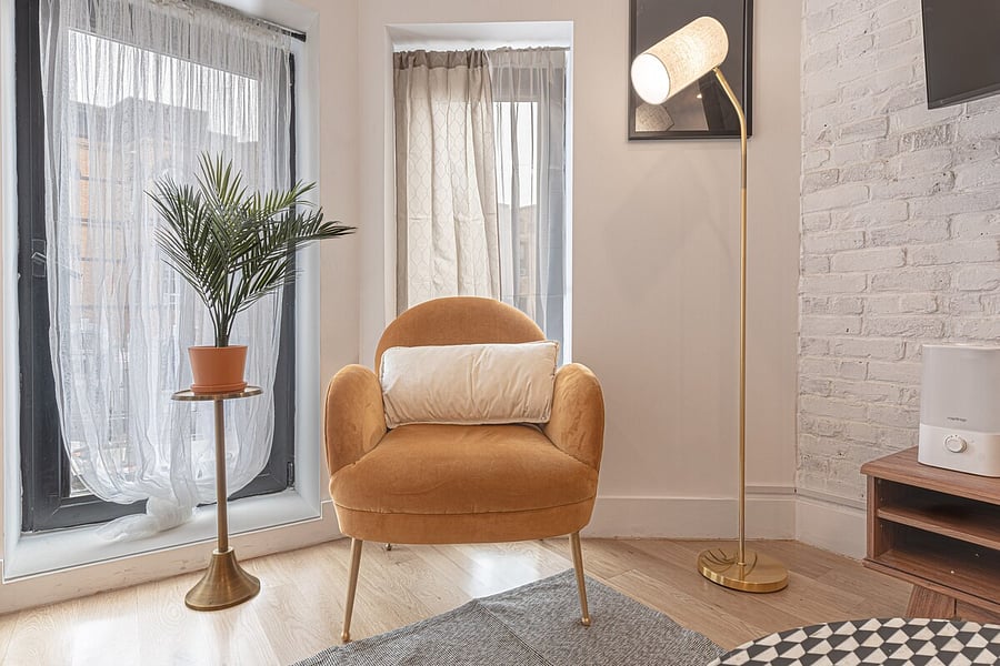 Calm bedroom with crisp, fresh linens and a private bath just steps away.