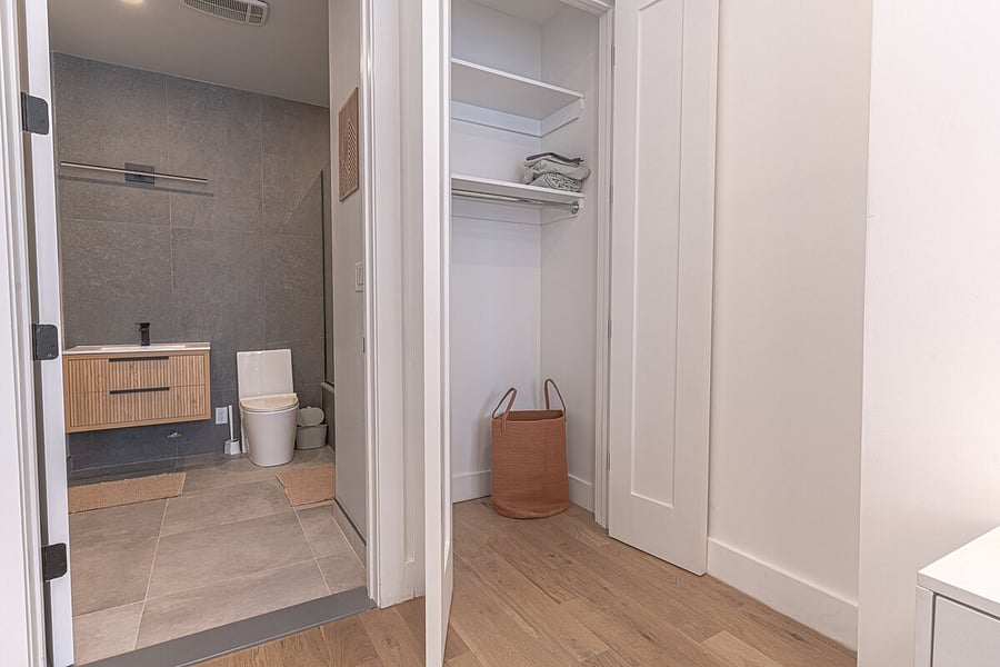 Comfortable home-office nook with a desk and TV by the window  work remotely with ease.