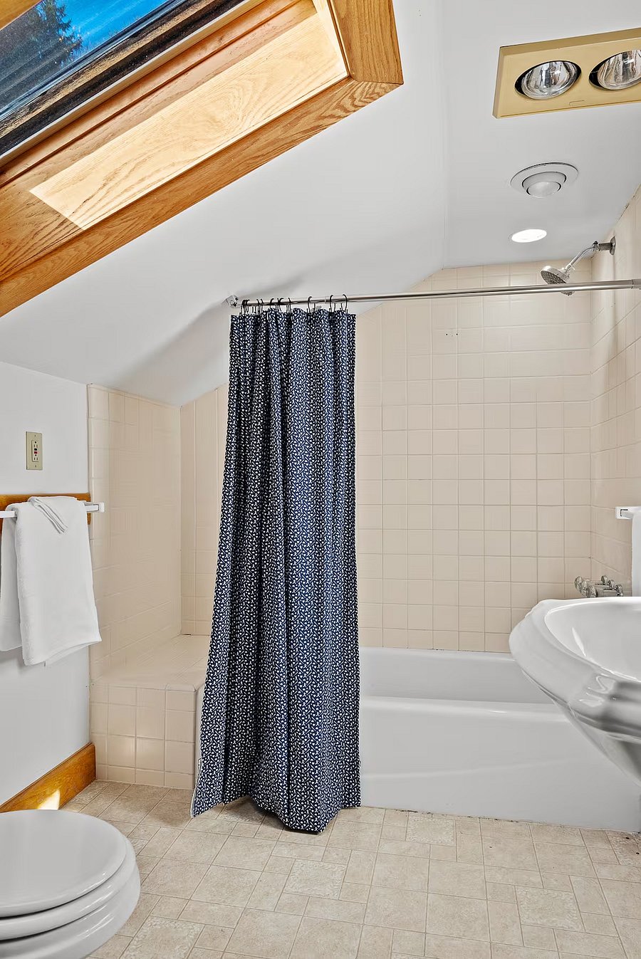 Bathroom 2: upstairs full bath. Bathroom 3 looks just like this, is upstairs as well and is the mirror image of this floorplan (but shower only)