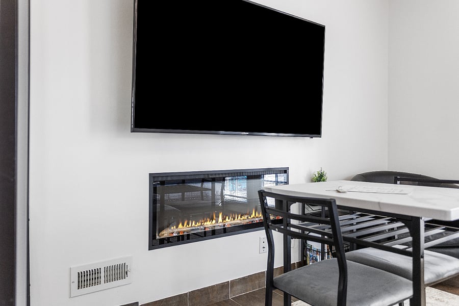 65" Smart TV and Relaxing Seating Area
