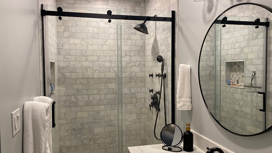 Luxurious marble walk-in shower featuring a rain shower, 8 body jets, and handheld shower wand.""Comfortable 