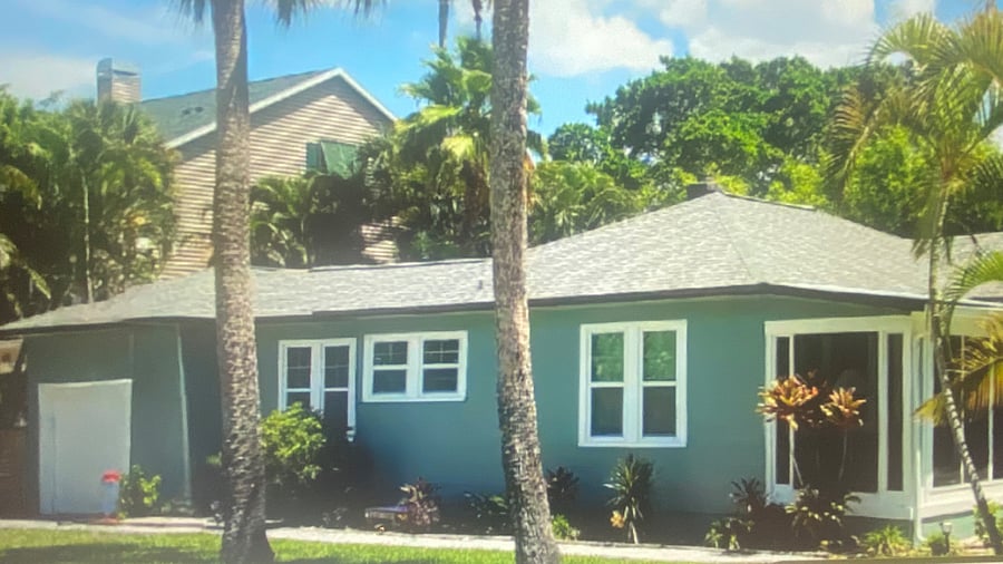 "Charming Cottage Villa featuring beautiful coastal architecture and welcoming shell-lined pathway aling the side of the home. Surrounded  by tropical landscaping, this inviting retreat offers classic coastal charm from the moment you arrived."