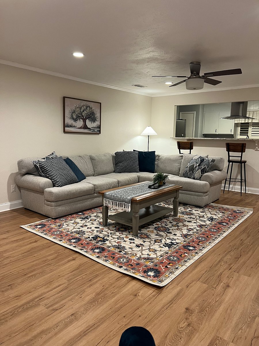 Cozy living space with ample seating, dimmable and dimensional lighting.