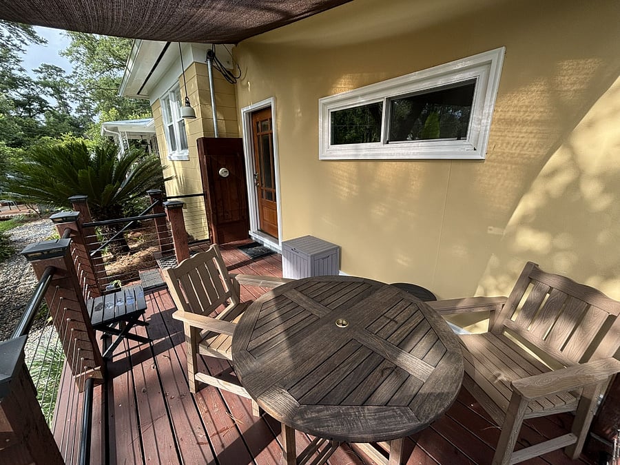 Porch with dining table and chairs